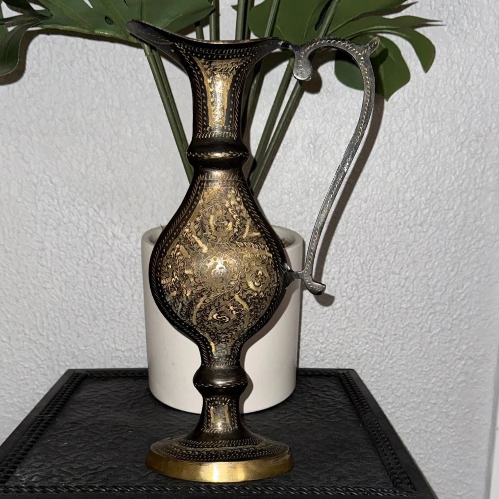 This is a‎ vintage decorative etched brass pitcher or ewer.